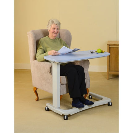 NRS Healthcare NRS EasyLift Overbed/Over Chair Table Modern Blue N43577 Height Adjustable - Curved Wheelchair Base