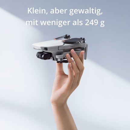 DJI Mini 2, Ultralight Foldable Camera Drone, 3-Axis Gimbal with 4K Camera, 12 MP, 31 min Flight Time, OcuSync 2.0, 10 km HD Video Transmission, QuickShots, Drone for Beginners, Gray