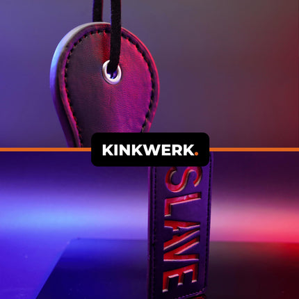 KINKWERK Spanking Paddle (lettering) made of high-quality synthetic leather for men and women | Ergonomic design with wrist strap | Multifunctional BDSM accessory (SLAVE)